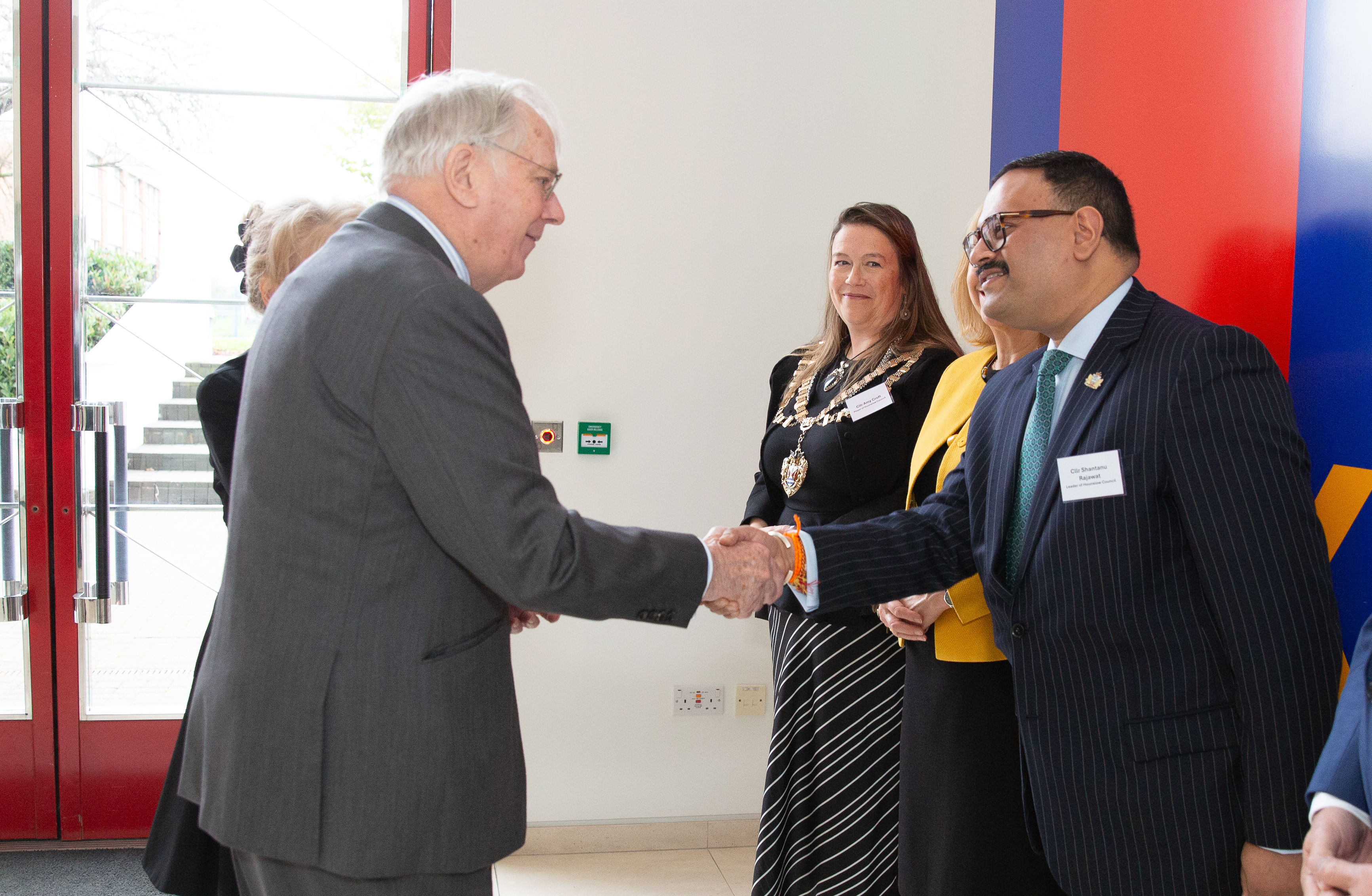 The Duke of Gloucester shakes hands with Hounslow Council Leader Shantanu Rajawat
