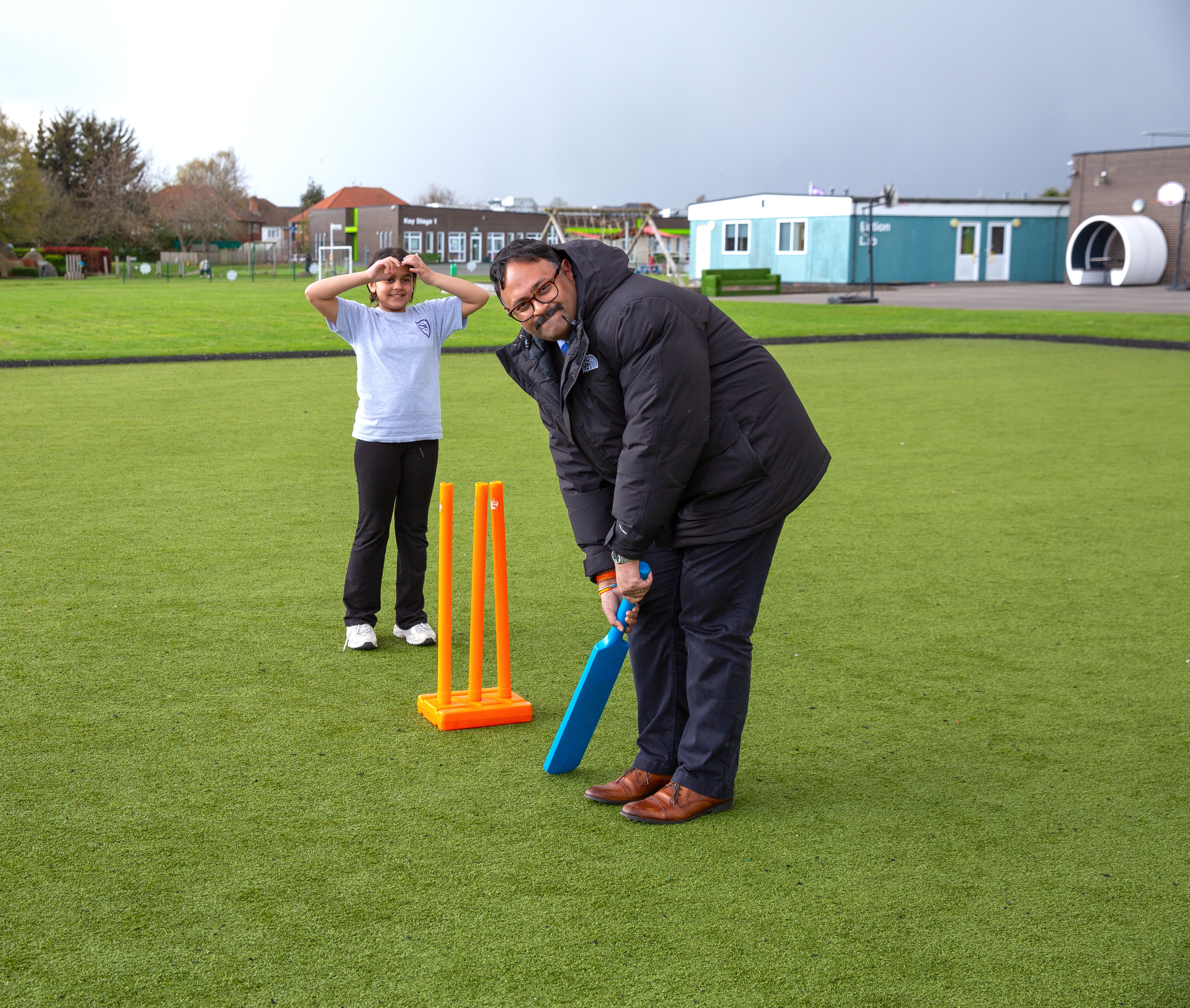 Cllr Rajawat playing cricket