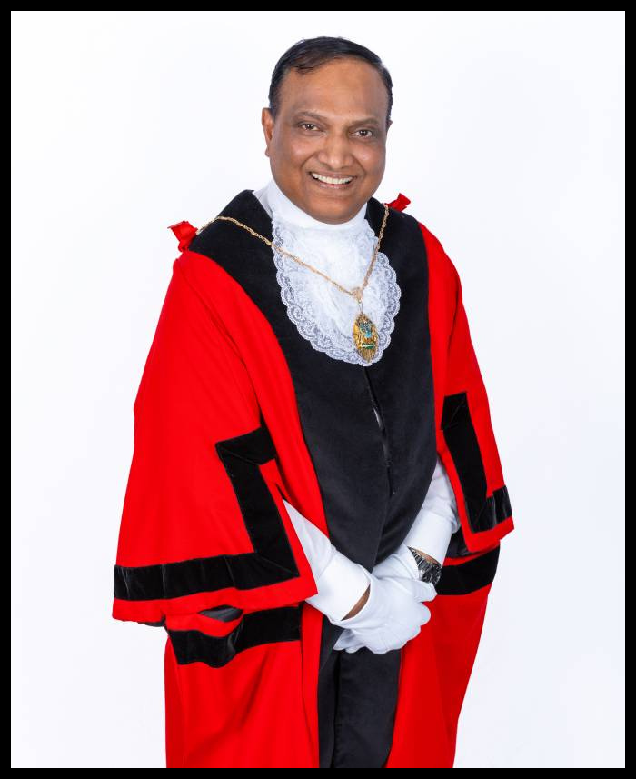 Deputy Mayor Junue Meah with a black border