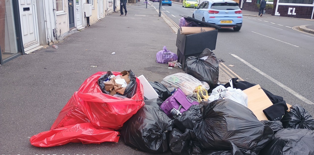 Rubibish flytipped in bin bags on the pavement