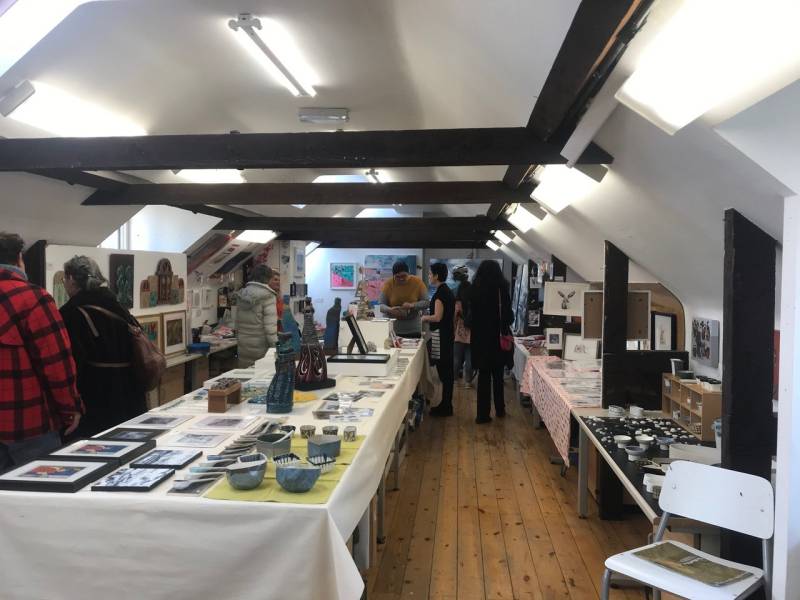 Interior shot of Redlees Studios, depicting members of the public attending an open studios event.