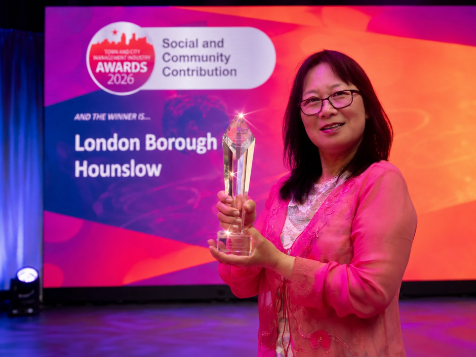 Council Officer holding the the Best Social and Community Contribution Award at the 2026 Town and City Management Industry (TCMI) Awards