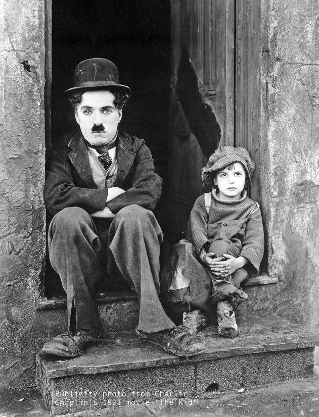 The chiswick cinematic audio tour poster of an adult and child sitting on doorstep